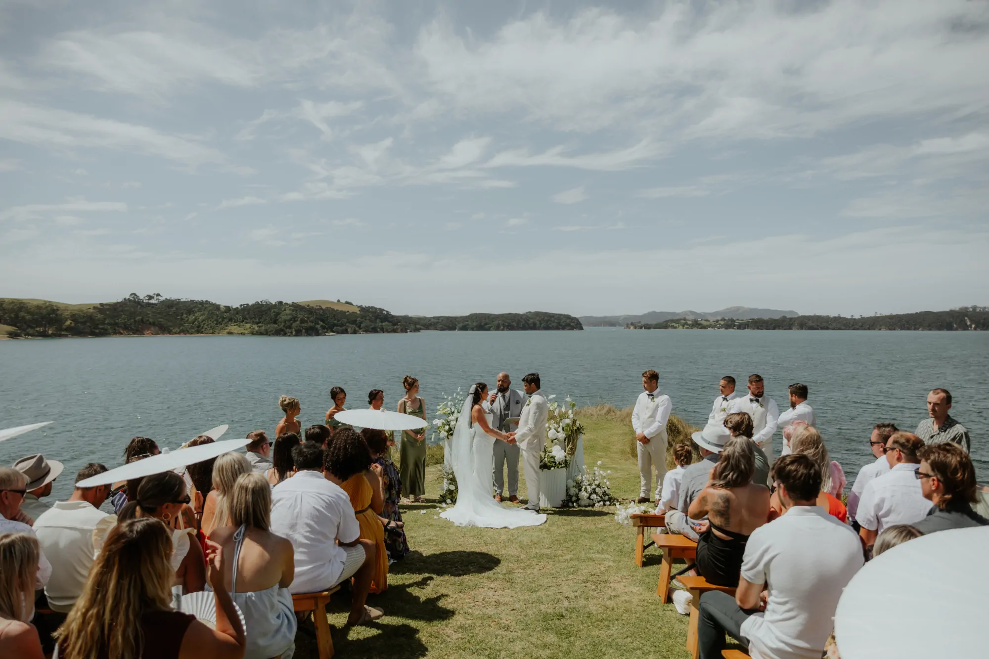 Nate Dunn officiating a wedding ceremony at Baylys' Farm in Bay of Islands