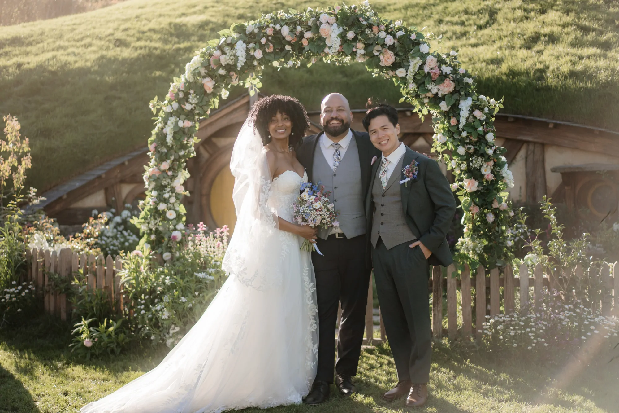 Nate Dunn officiating a wedding ceremony at Hobbiton in Matamata